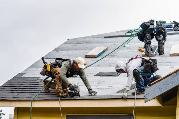 Professional Roofing technician working in Mamaroneck, NY